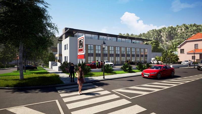 Frontansicht der Wohnresidenz Neigoart mit Einkaufszentrum