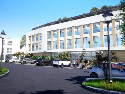 Rear view of the Neigoart residence with shopping centre