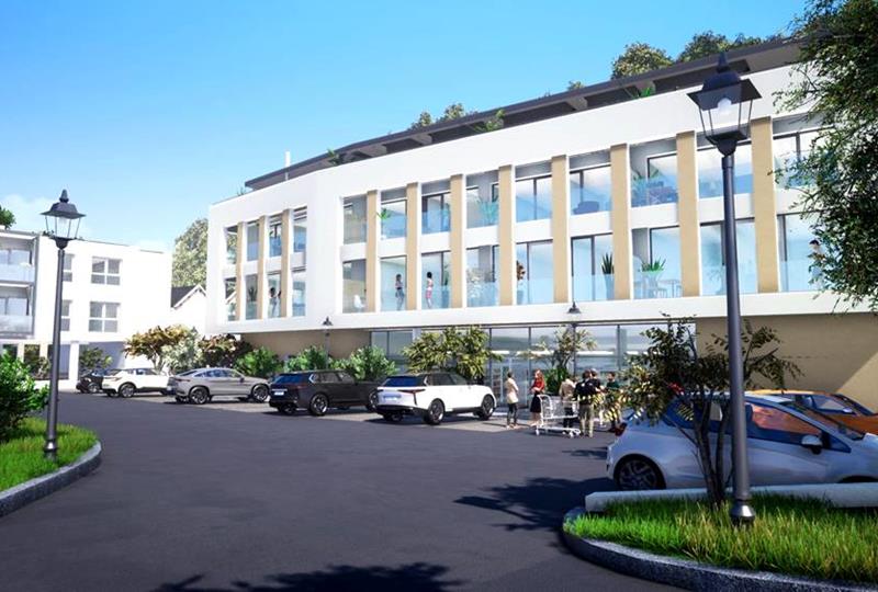 Rückansicht der Wohnresidenz Neigoart mit Einkaufszentrum